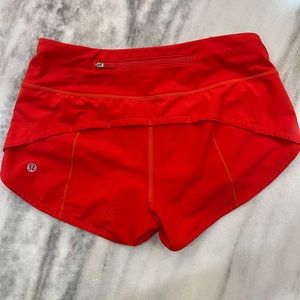 carnation red lululemon hotty hot shorts!!